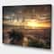 Designart - Grassy and beach sunset - Sea & Shore Photography on wrapped Canvas
